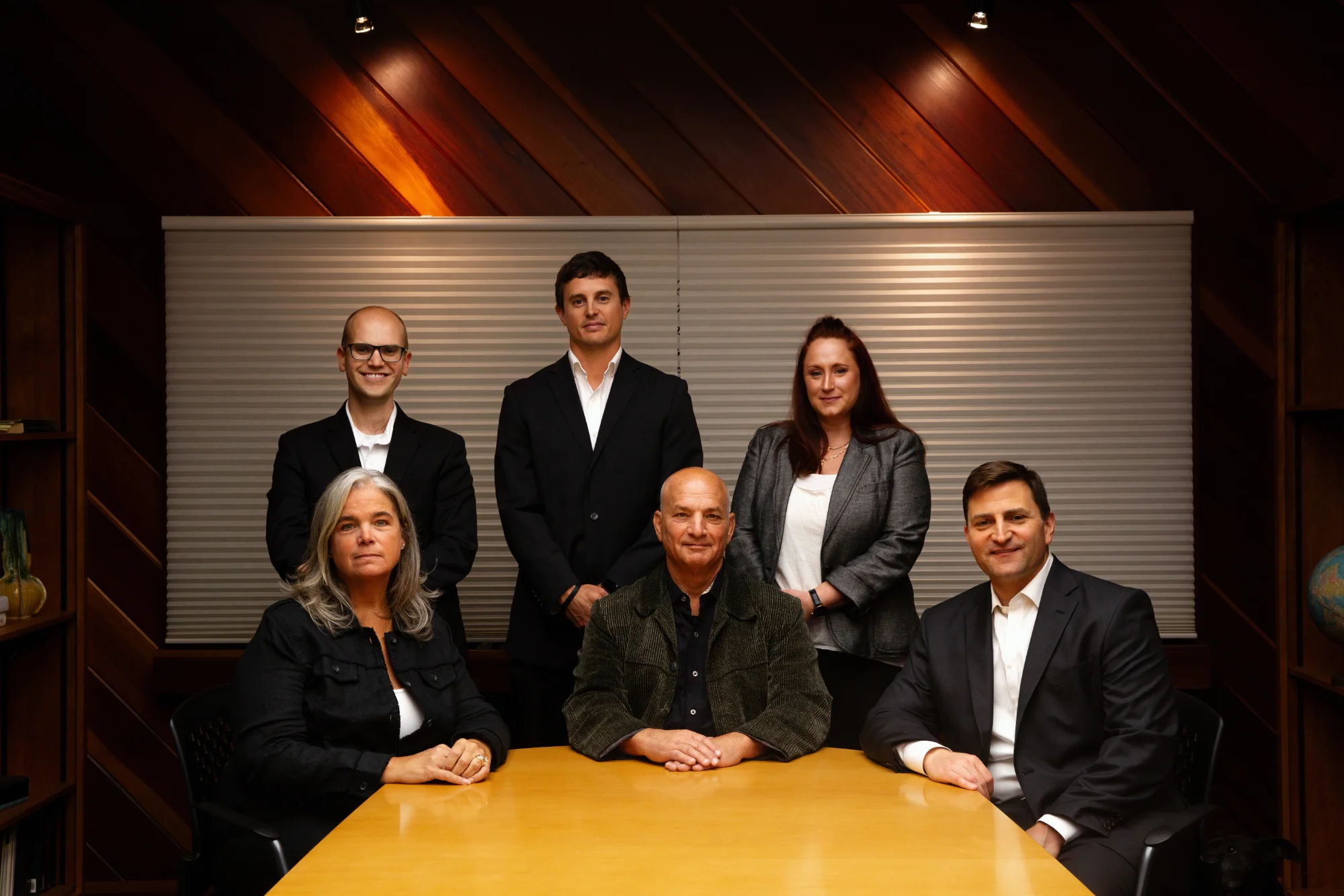 The firm's trial team in a conference room